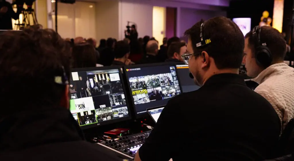 man with headset on operating a live streaming platform