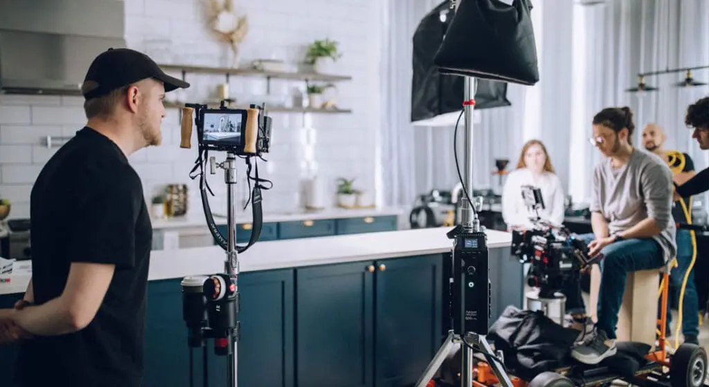 JV studios employee setting up a shot for a zip water commercial