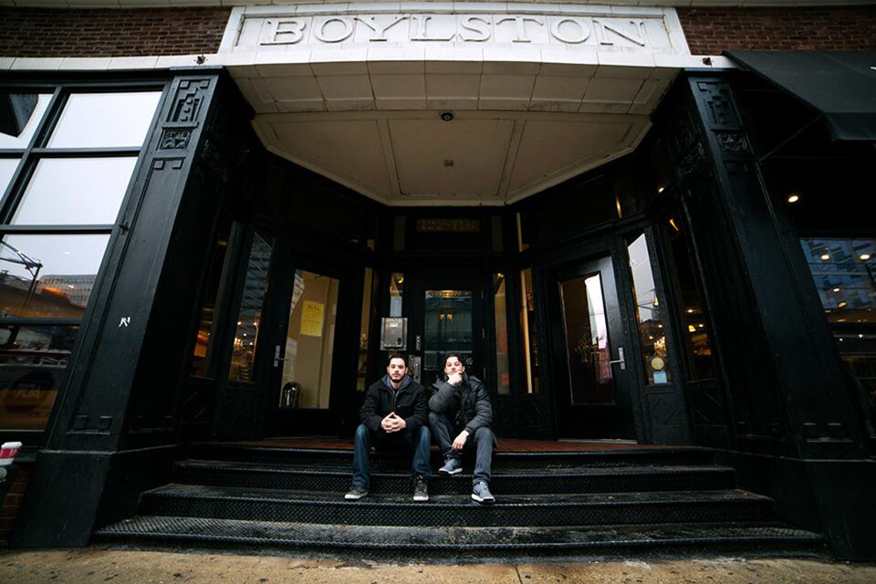 jv studios sitting outside of the boylston building in Chicago