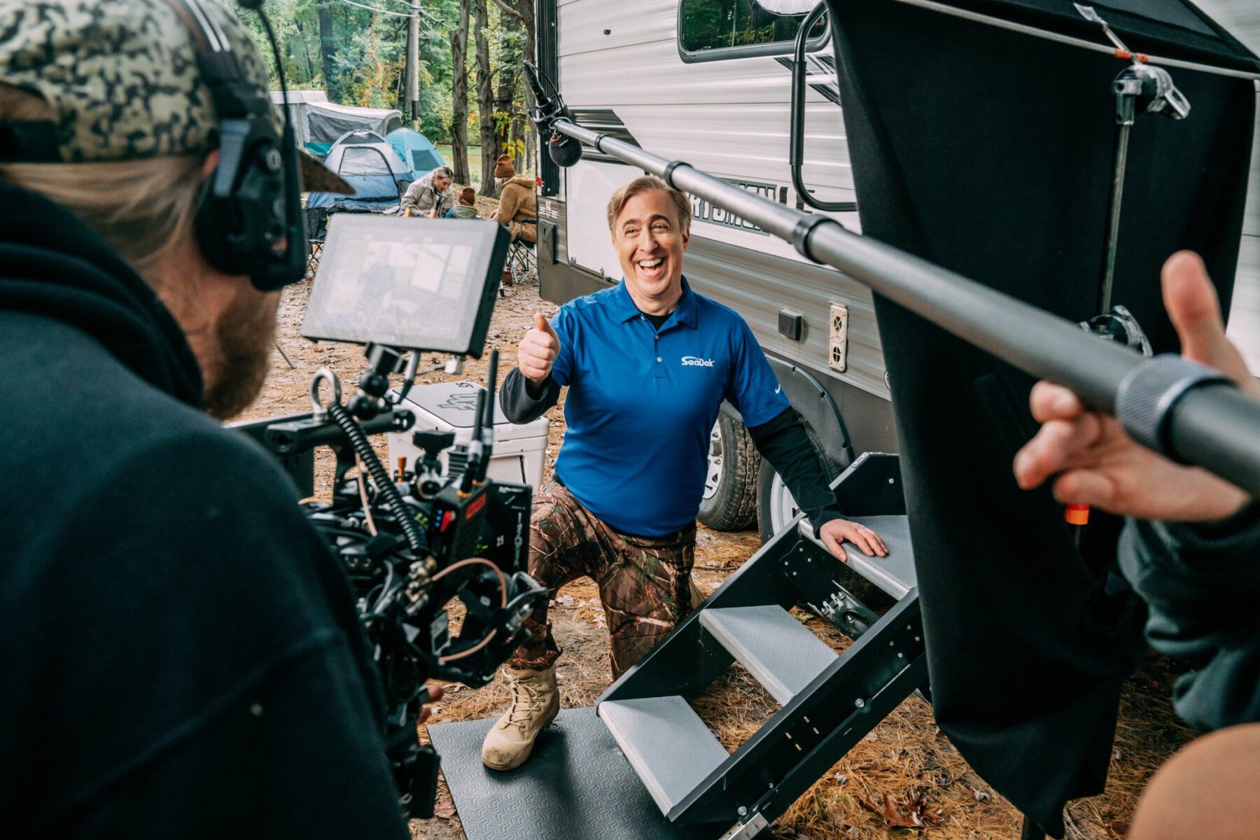 actor smiling on camera