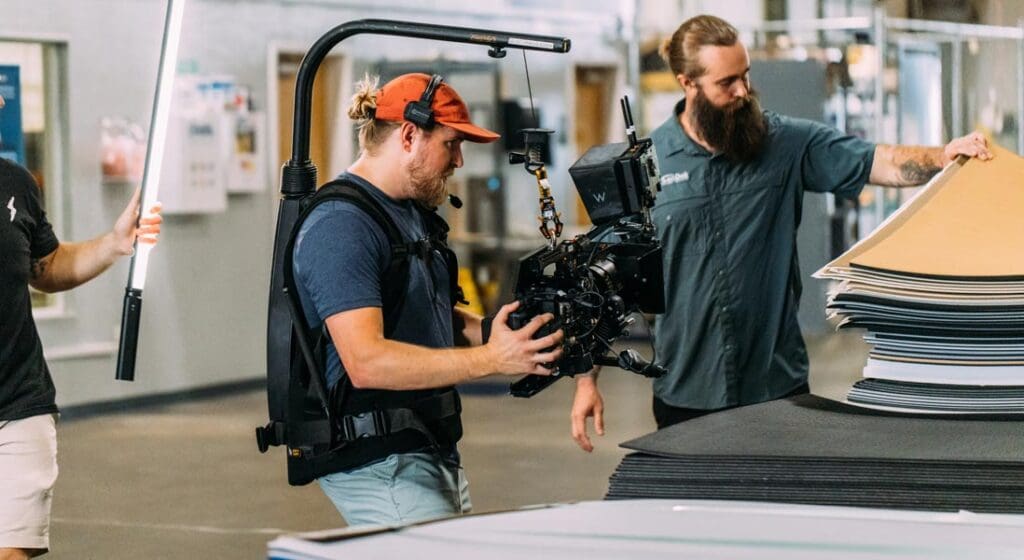 man operating camera filming seadek products